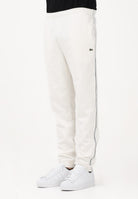 LACOSTE Pantalone sportivo bianco da uomo con rifiniture laterali logate XH0883 70V LACOSTE 