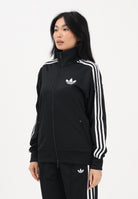ADIDAS ORIGINALS Felpa con zip Firebird Loose nera da donna KD7983 . ADIDAS ORIGINALS 