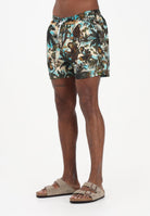 DSQUARED2 Shorts mare verde militare da uomo con stampa tropicale D7B626790 357 DSQUARED2 