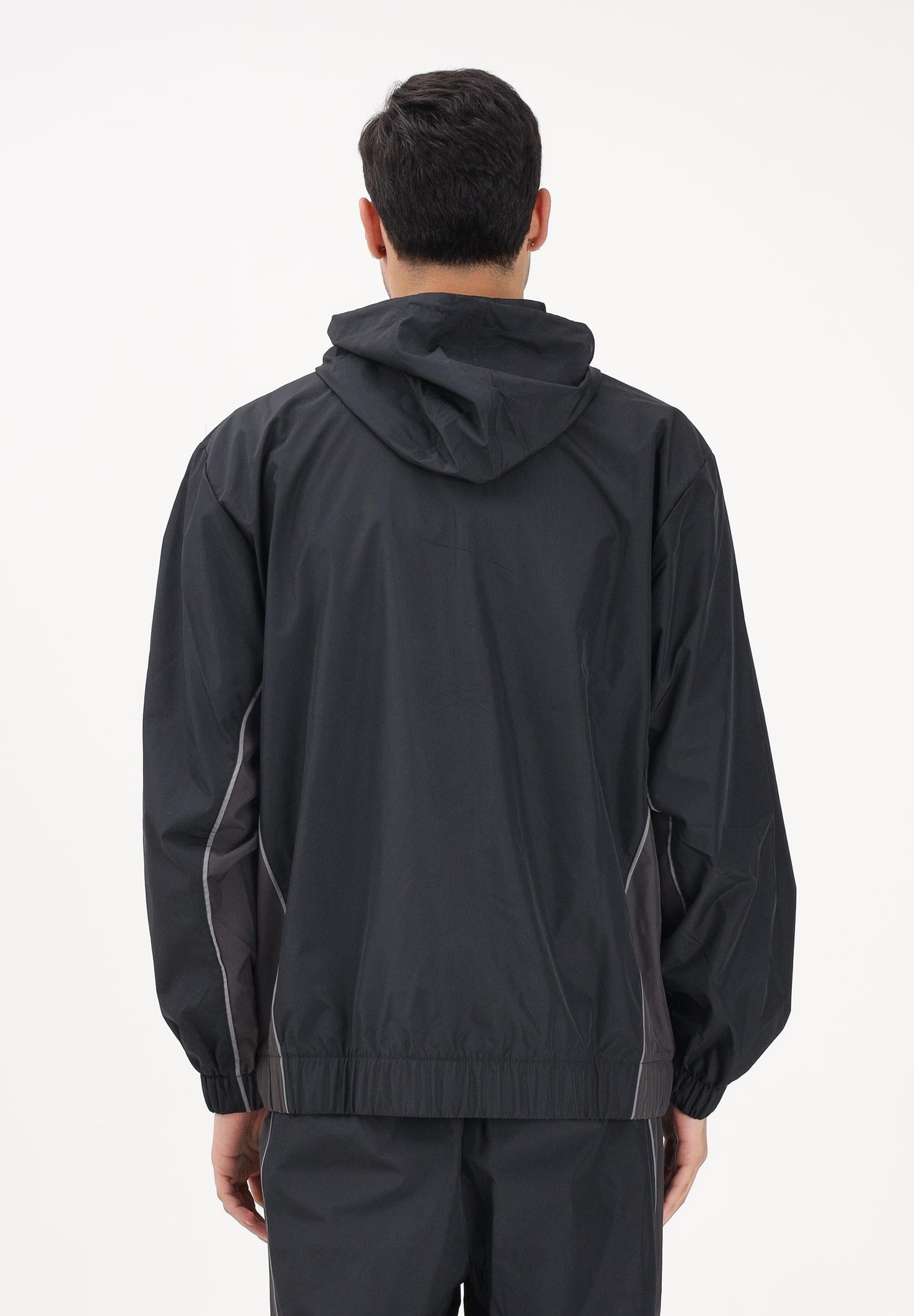 NEW BALANCE Giacca a vento Trackside nera da uomo MJ61A4P8BK . NEW BALANCE 