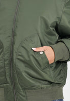 DIESEL Bomber verde militare per donna, ragazzi e bambini con maxi logo Oval Diesel J023980KAUX K513 DIESEL 