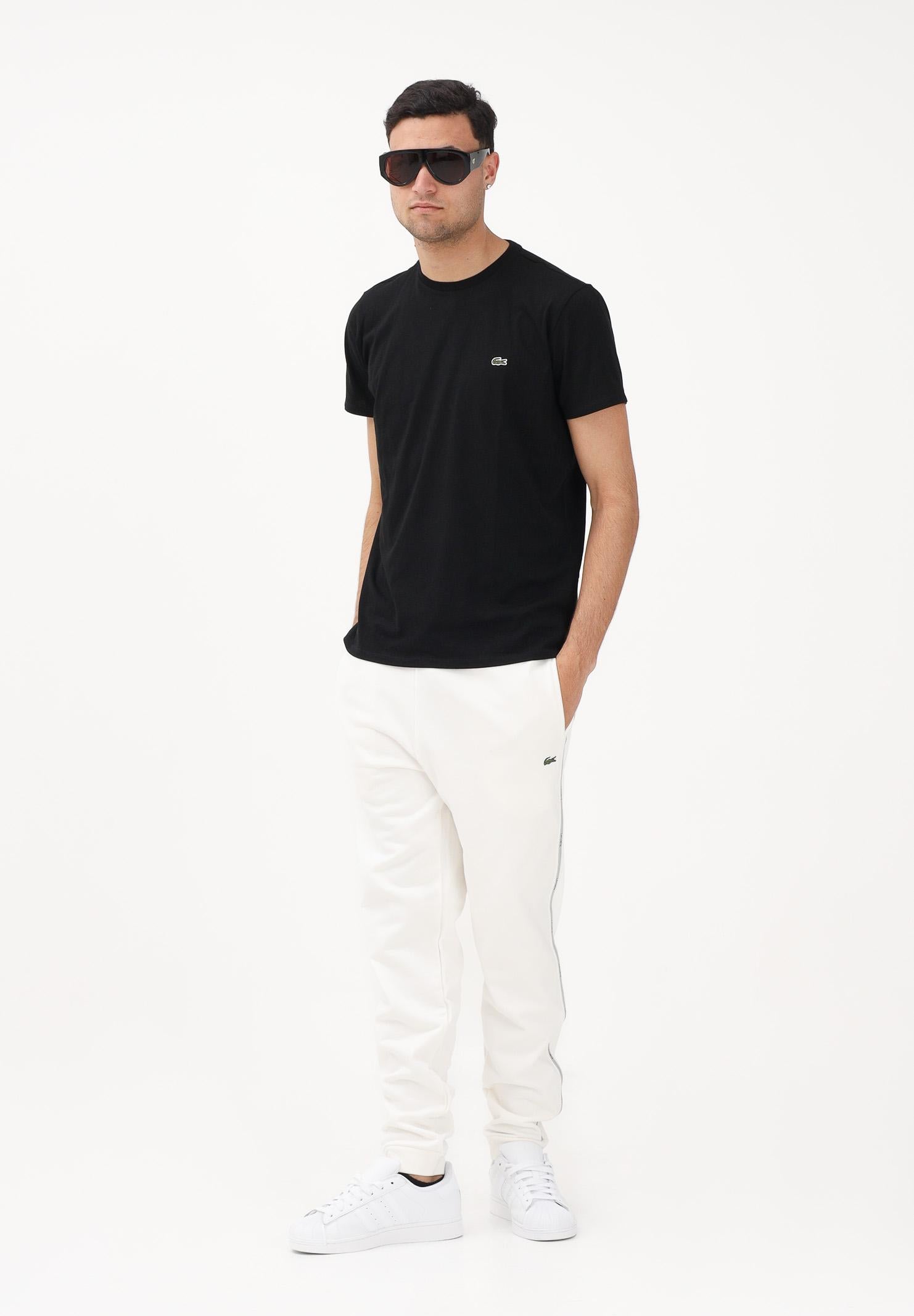 LACOSTE Pantalone sportivo bianco da uomo con rifiniture laterali logate XH0883 70V LACOSTE 