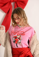 ONLY T-shirt a manica corta rosa da donna con stampa Coca Cola 15355794 SachetPink ONLY 