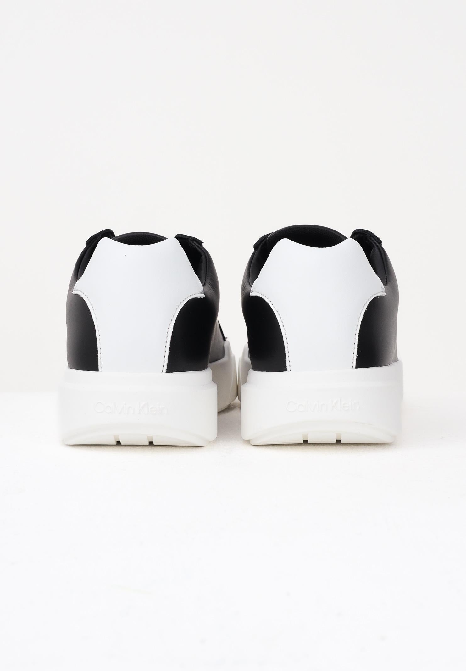 CALVIN KLEIN JEANS Sneakers nere da uomo con logo YM0YM013440GM . CALVIN KLEIN JEANS 