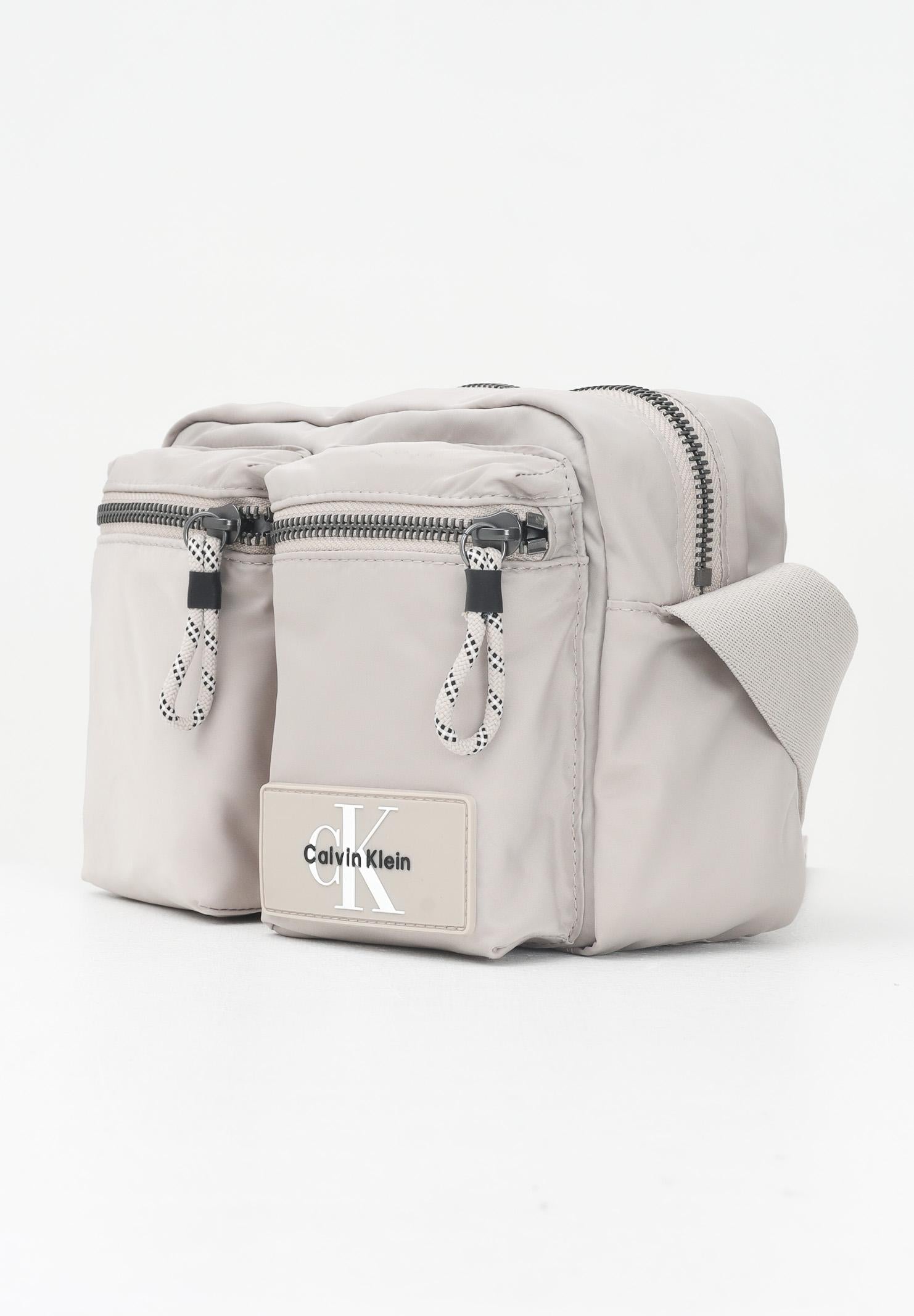 CALVIN KLEIN Borsa a tracolla beige: stile tecnico uomo e donna