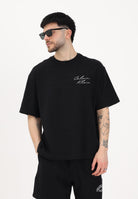 CALVIN KLEIN JEANS T-shirt a manica corta nera da uomo con logo frontale e stampa sul retro LV04RE828G UB1 CALVIN KLEIN JEANS 