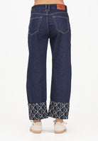 CALVIN KLEIN JEANS Jeans in denim blu da donna con risvolto logato LV047D711GZ1H . CALVIN KLEIN JEANS 