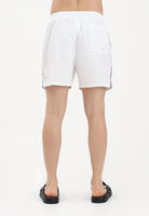 NIKE Shorts mare bianco da uomo con banda laterale logata NESSG555 100 NIKE 
