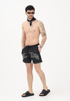 GCDS Shorts mare nero e bianco da uomo con logo C1MEQS249T016 999A GCDS 