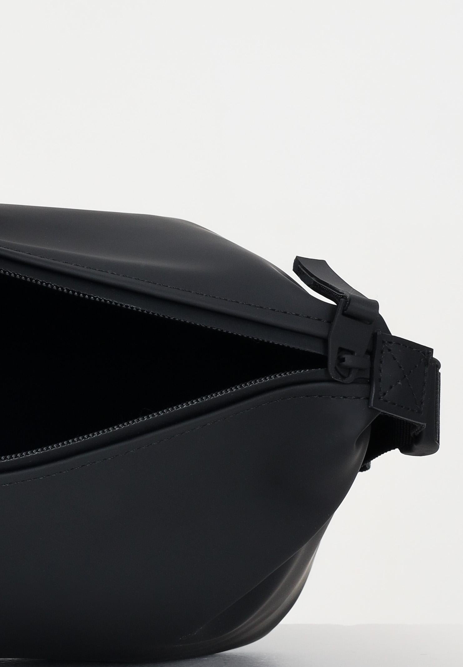 RAINS Pochette Hilo Nera: Borsa da Toilette Impermeabile Uomo Donna