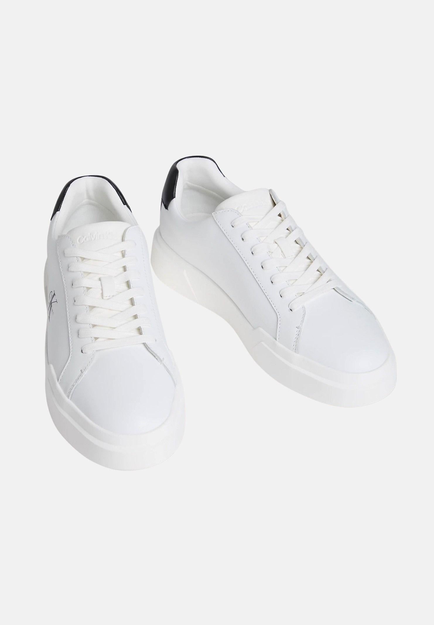 CALVIN KLEIN JEANS Sneakers in pelle con logo, colore brand White/Black/White corrispondente al bianco e nero, da uomo. YM0YM01344 06X CALVIN KLEIN JEANS 