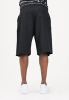 VERSACE JEANS COUTURE Shorts nero da uomo con punto vita logato 80GAD119N0645 899 VERSACE JEANS COUTURE 
