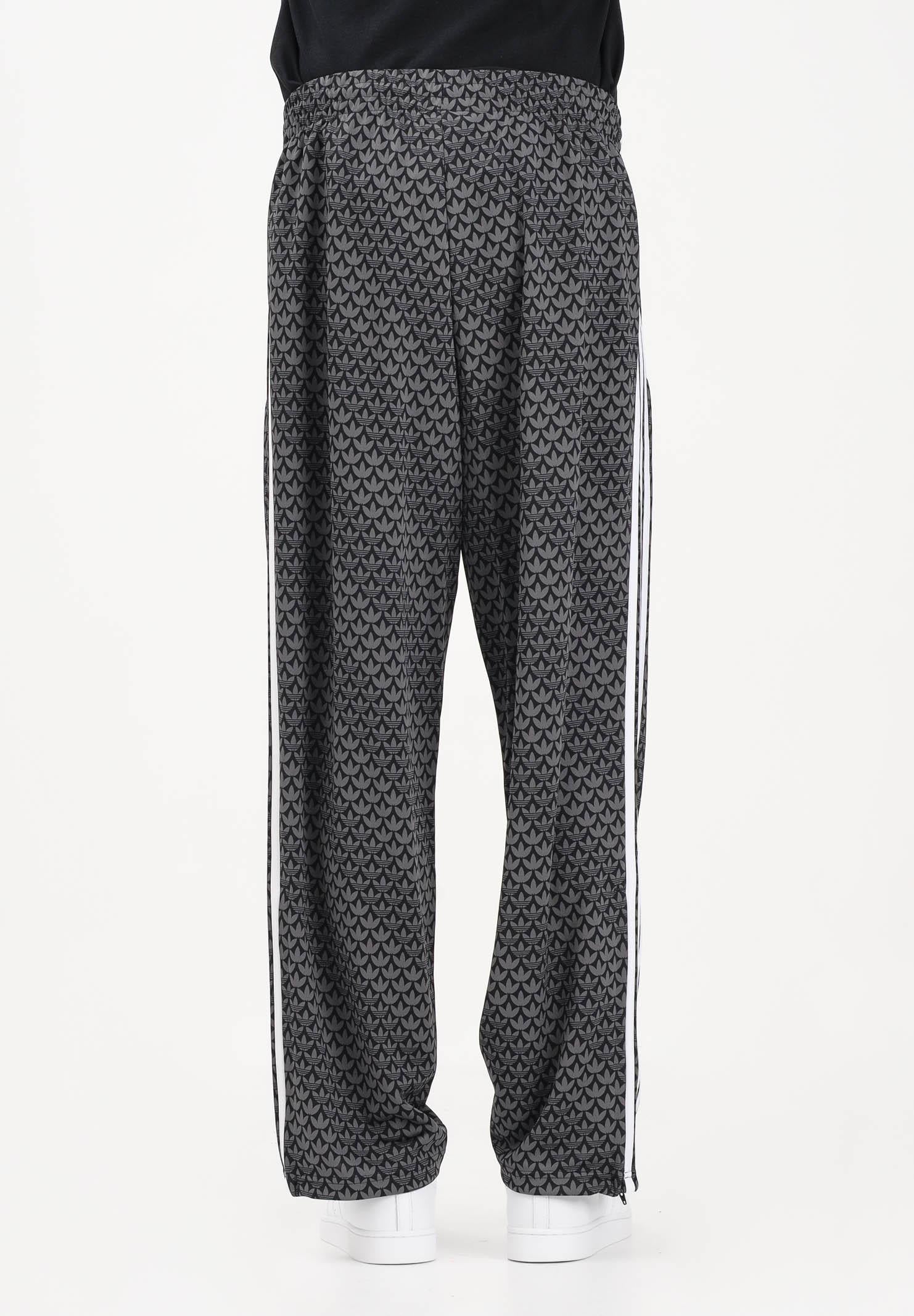 ADIDAS ORIGINALS Pantalone sportivo FIREBIRD LOOSE MONOGRAM nero da uomo KC9159 . ADIDAS ORIGINALS 