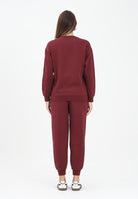 PUMA Tuta sportiva bordeaux da donna con logo 688160 96 PUMA 