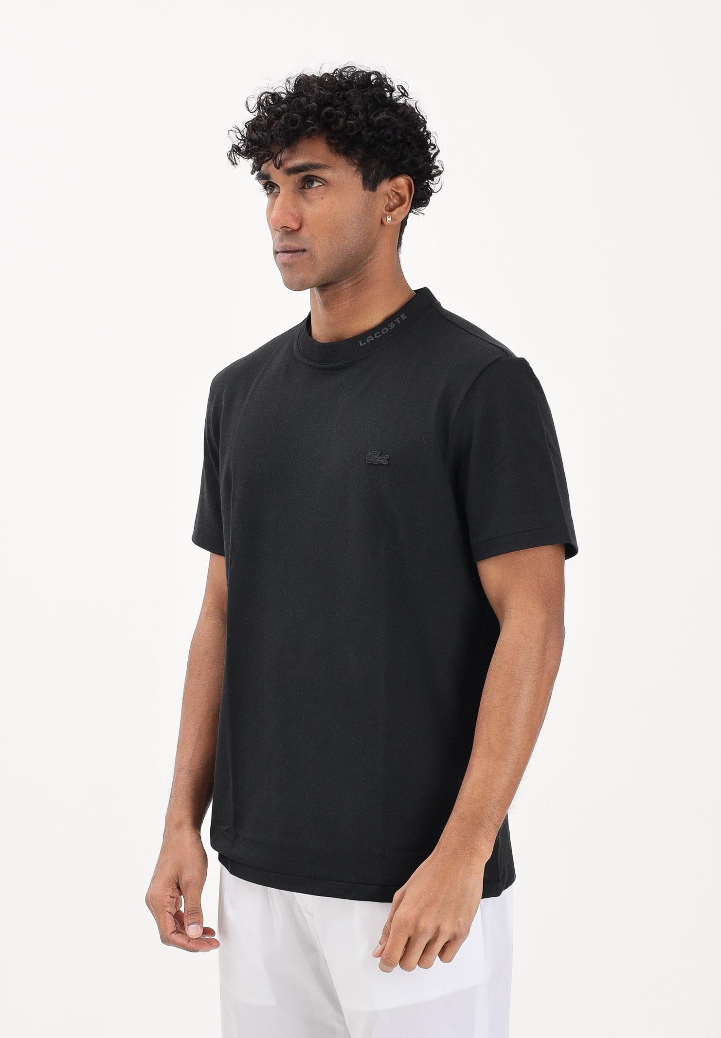 LACOSTE T-shirt a manica corta nera da uomo in piqué con marchio jacquard TH5060 031 LACOSTE 