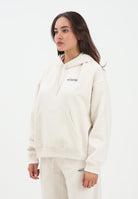 NEW BALANCE Felpa con cappuccio panna da donna rifinita da stampa logo WT53515LIN . NEW BALANCE 