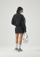 ADIDAS ORIGINALS  gonna corta Mid Rise Denim Skirt True Black Denim nera donna KQ6485 . ADIDAS ORIGINALS 