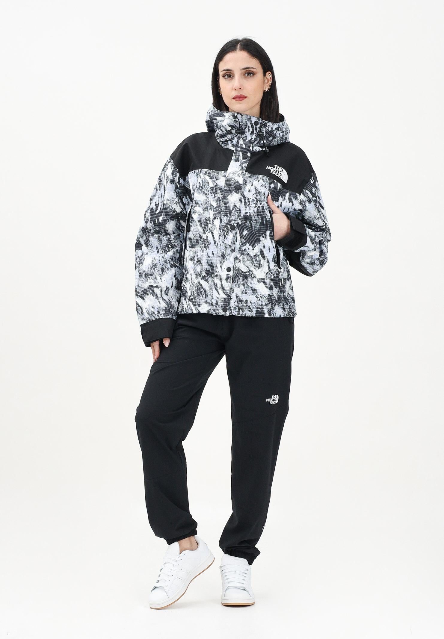 THE NORTH FACE Pantalone antivento Mountain Athletics nero da donna NF0A8BGPJK31 . THE NORTH FACE 
