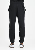 LACOSTE Pantalone sportivo nero per uomo e donna con riga logata XH9803 031 LACOSTE 