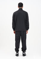 PUMA Tuta Poly Tape nera da uomo 684853 01 PUMA 