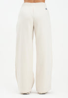 NEW BALANCE Pantalone sportivo panna da donna con logo WP53903LIN . NEW BALANCE 