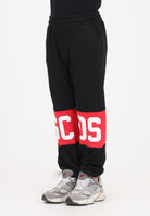 GCDS Pantalone sportivo nero per donna, ragazzi e bambini con fascia a contrasto e logo B2JU3017BA2 99 GCDS 