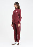 PUMA Tuta Ess + Textured Foil FZ bordeaux da donna 692202 96 PUMA 
