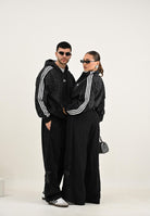 ADIDAS ORIGINALS Felpa con cappuccio Leo All Over Print Loose nera da donna JV7561  ADIDAS ORIGINALS 