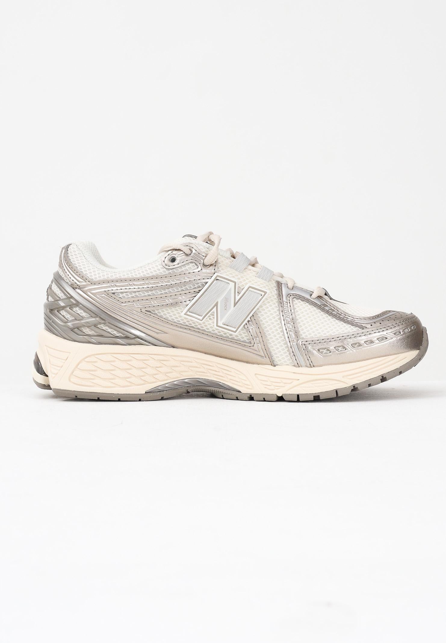 NEW BALANCE Sneakers 1906R panna e argento per uomo e donna U1906RCN  NEW BALANCE 