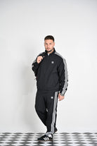 ADIDAS ORIGINALS Pantalone sportivo Adicolor Woven Firebird nero da uomo IT2501  ADIDAS ORIGINALS 