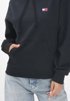 TOMMY JEANS Felpa con cappuccio nera da donna rifinita da logo DW0DW19414BDS  TOMMY JEANS 