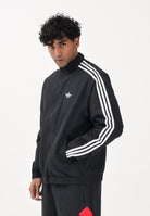 ADIDAS ORIGINALS Giacca a vento Firebird Woven nera da uomo KE1366 . ADIDAS ORIGINALS 
