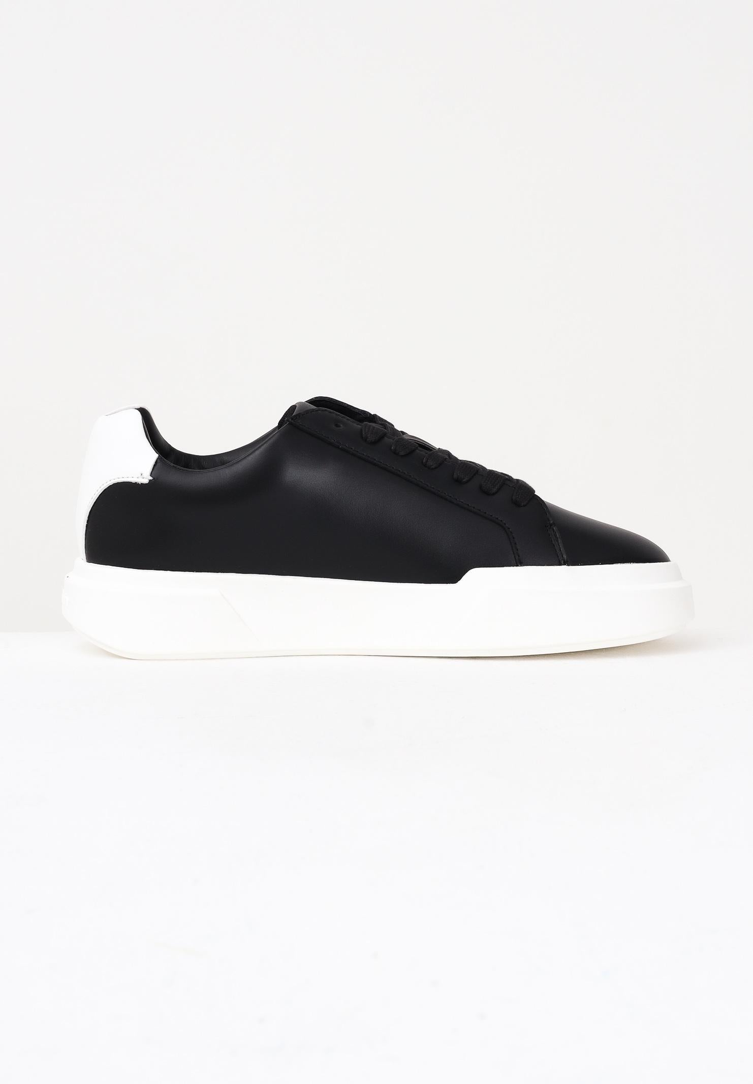 CALVIN KLEIN JEANS Sneakers nere da uomo con logo YM0YM013440GM . CALVIN KLEIN JEANS 