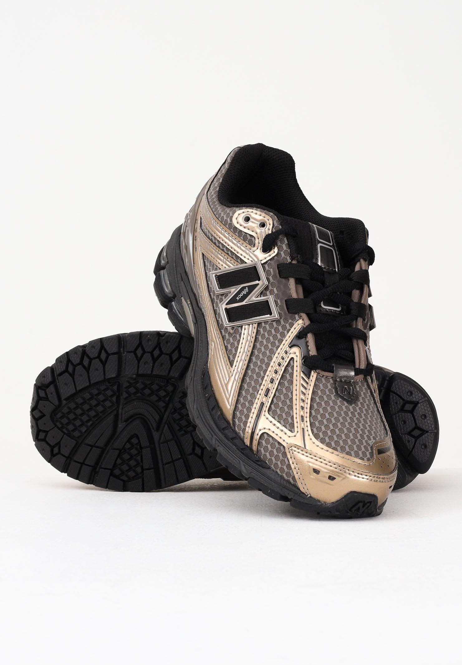 NEW BALANCE Sneakers 1906R nere, beige e oro da uomo U1906RCJ . NEW BALANCE 
