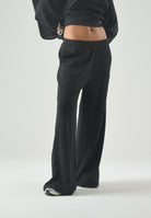 TOMMY JEANS pantaloni da tuta TJW Wide Leg Sweatpant Black nero donna. DW0DW22951 BDS TOMMY JEANS 