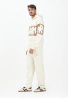 DISCLAIMER Pantalone sportivo panna da uomo con logo 25IDS54808 LA DISCLAIMER 