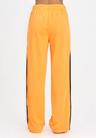 ADIDAS ORIGINALS Pantalone sportivo Adicolor Classic Firebird Loose arancione fluo da donna JY2694 . ADIDAS ORIGINALS 