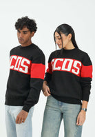 GCDS Maglioncino girocollo nero per uomo e donna impreziosito da banda a contrasto e logo B2CM1505KI4 99 GCDS 