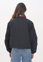TOMMY JEANS Giacca trapuntata nera da donna con logo Tommy Jeans DW0DW21436BDS  TOMMY JEANS 