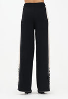HINNOMINATE Pantalone in maglia nero da donna con banda laterale logata HMABW02131 NE01 HINNOMINATE 