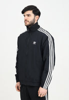 ADIDAS ORIGINALS Giacca a vento Adicolor Woven Firebird nera da uomo IT2491 . ADIDAS ORIGINALS 