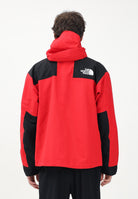 THE NORTH FACE Giacca a vento Mountain Mono rossa da uomo NF0A88XFKZ31 . THE NORTH FACE 
