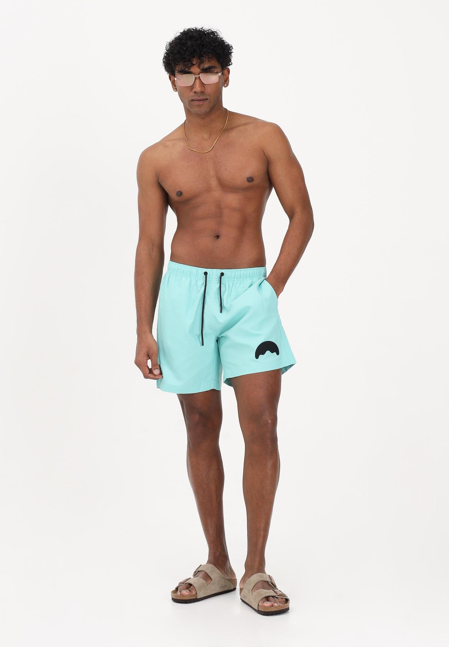 SPRAYGROUND Shorts mare verde acqua da uomo con patch shark SP925AQUA . SPRAYGROUND 