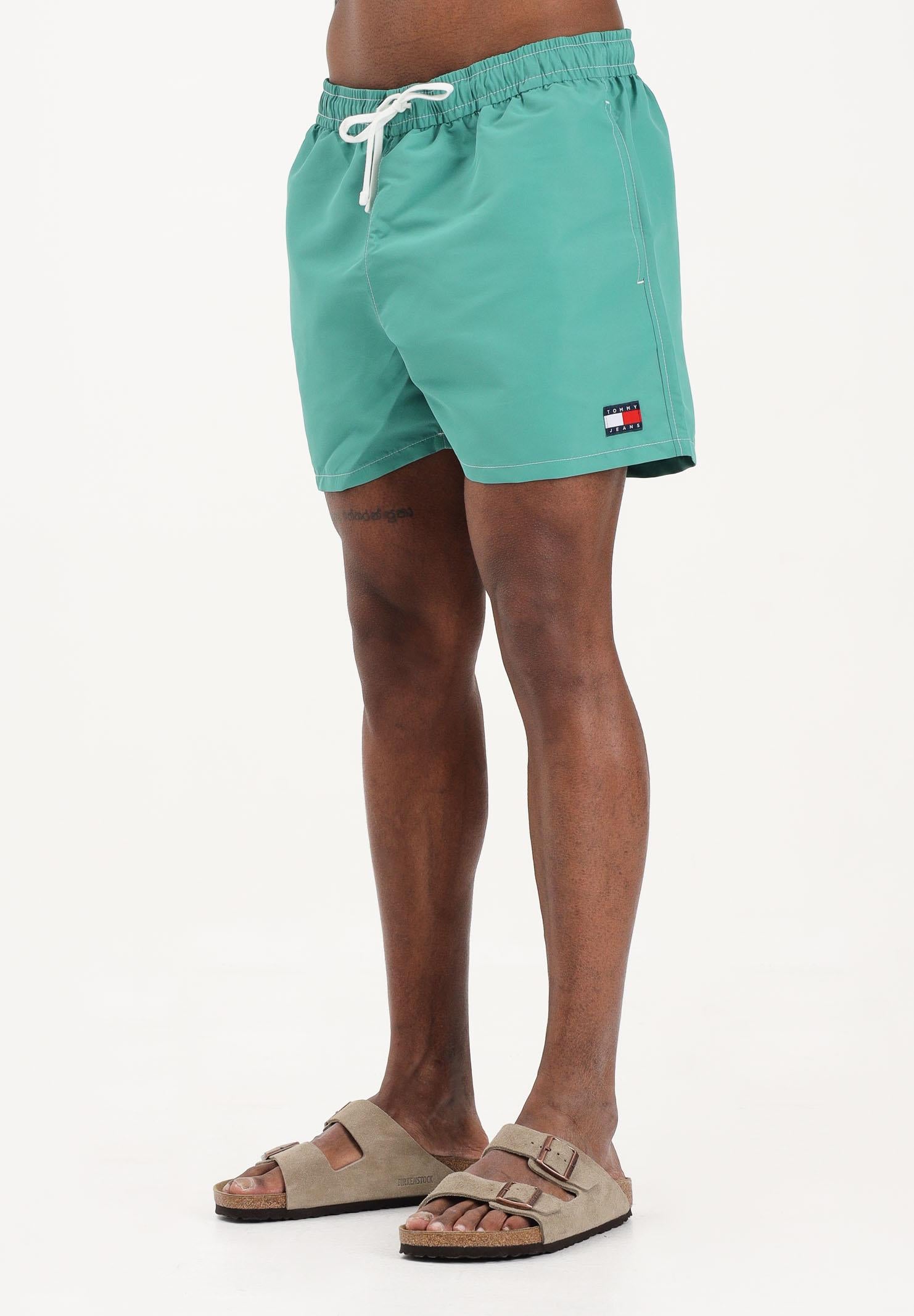 TOMMY HILFIGER Shorts mare verde da uomo con logo UM0UM03852 L5Y TOMMY HILFIGER 
