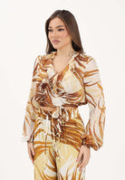 JUST CAVALLI Blusa beige da donna con stampa di foglie stilizzate 80PAL214NS775 638 JUST CAVALLI 