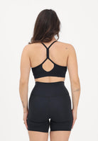 NEW BALANCE Top sportivo NB Essential nero da donna WB51039BK . NEW BALANCE 