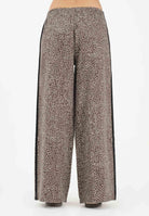 ADIDAS ORIGINALS Pantalone sportivo Firebird Oversized AOP in denim animalier da donna KD8811 . ADIDAS ORIGINALS 