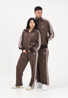 ADIDAS ORIGINALS Pantalone sportivo FIREBIRD LOOSE MONOGRAM marrone per uomo e donna KE1678 . ADIDAS ORIGINALS 