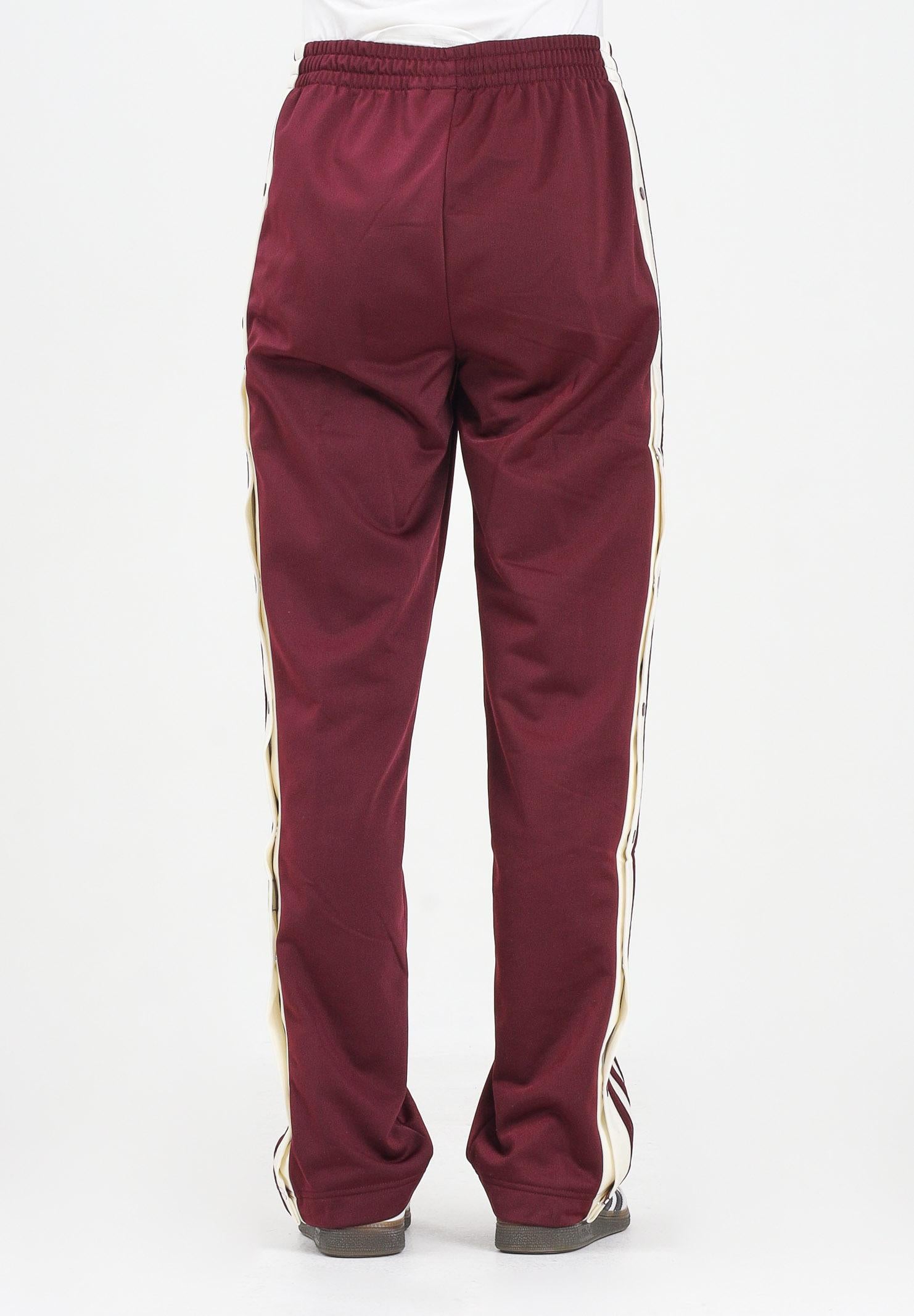 ADIDAS ORIGINALS Pantalone sportivo Adibreak bordeaux da donna KA7732 . ADIDAS ORIGINALS 