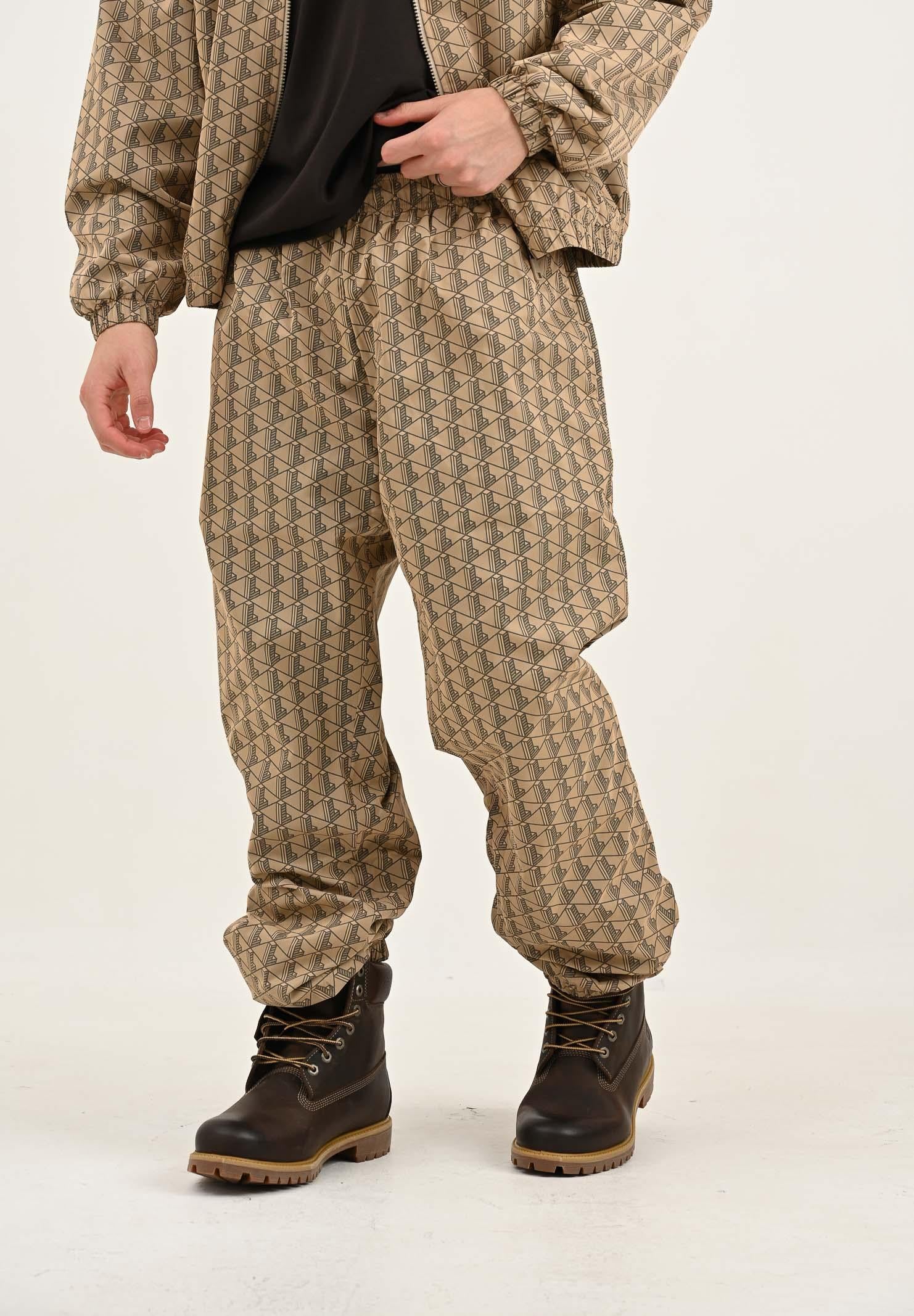 LACOSTE Pantalone sportivo beige da uomo con monogramma XH8908 IXQ LACOSTE 